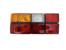 Volvo sedan Tail light assembly 740, 760, 760, COMPLETE Taillight with black trim Left side/Driver side 3518920 