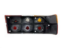 Volvo sedan  Taillight HOUSING ONLY 740, 760, 760, OPTICAL UNIT ONLY BLACK trim Left side/Driver side 3518920