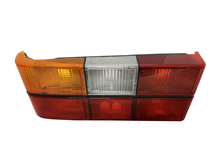 Volvo sedan taillight 240, 244, Tail light OPTICAL UNIT ONLY BLACK center molding Left side/Driver side 1372449 