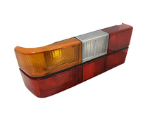 Volvo sedan taillight 240, 244, Tail light OPTICAL UNIT ONLY BLACK center molding Left side/Driver side 1372449 