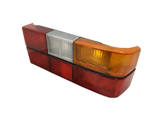 Volvo sedan taillight 240, 240, Tail light OPTICAL UNIT ONLY BLACK center molding for Right side/Passenger side 1372450. 