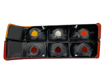 Volvo sedan taillight 240, 240, Tail light OPTICAL UNIT ONLY BLACK center molding for Right side/Passenger side 1372450. 