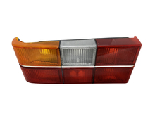 1372226 C Volvo sedan 240, 244, Tail light complete assembly with chrome center molding Left side/Driver side 