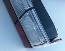 Tail light set with clear and red lenses and chrome center molding  for Volvo. sedan 740, 760, 