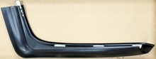 Volvo 240  station wagon , left rear drivers side bumper molding 1247261