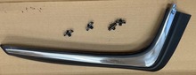 Volvo 240  station wagon , left rear drivers side bumper molding 1247261