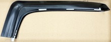 Volvo 240  station wagon , right rear passengers side bumper molding 1247262