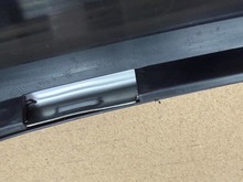 Volvo 240  station wagon , right rear passengers side bumper molding 1247262
